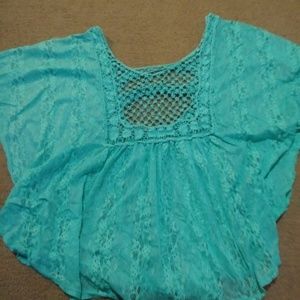 Teal lace shirt. Wing arms